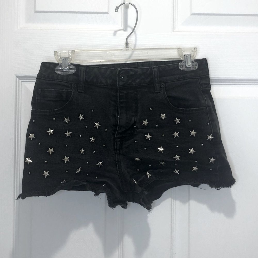 Black Heart black low rise shorts with silver stars, size 3